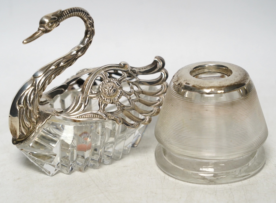 A white metal mounted glass match strike and a silver mounted swan bon bon dish, 10cm. Condition - poor to fair